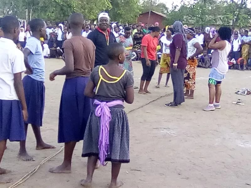 Young people in a community awareness activity